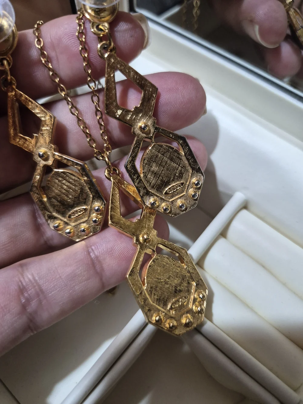 Avon gold tone